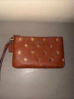 Coach Brown Pebbled Leather Wristlet with Gold Apple Accents